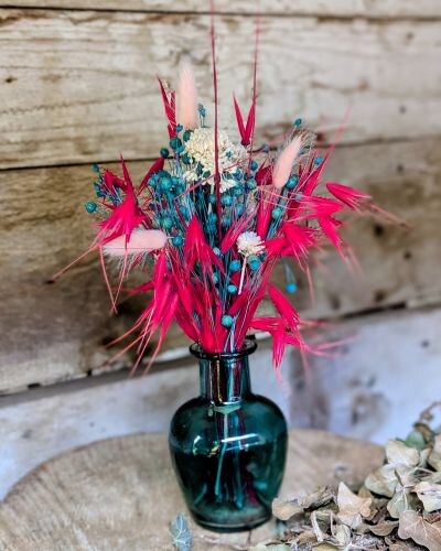Bouquet de fleurs séchées vase vert